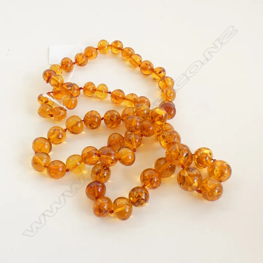 LONG STRING OF AMBER BEADS Image 1++