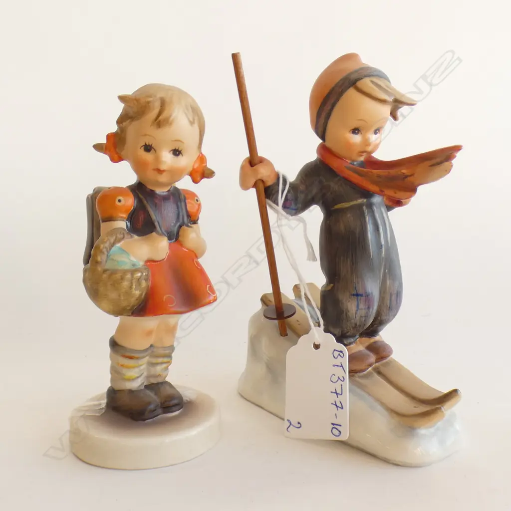 2 HUMMEL FIGURINES - BOY SKIING (H 135MM) & GIRL WITH BACKPACK (H 115MM) Image 1++