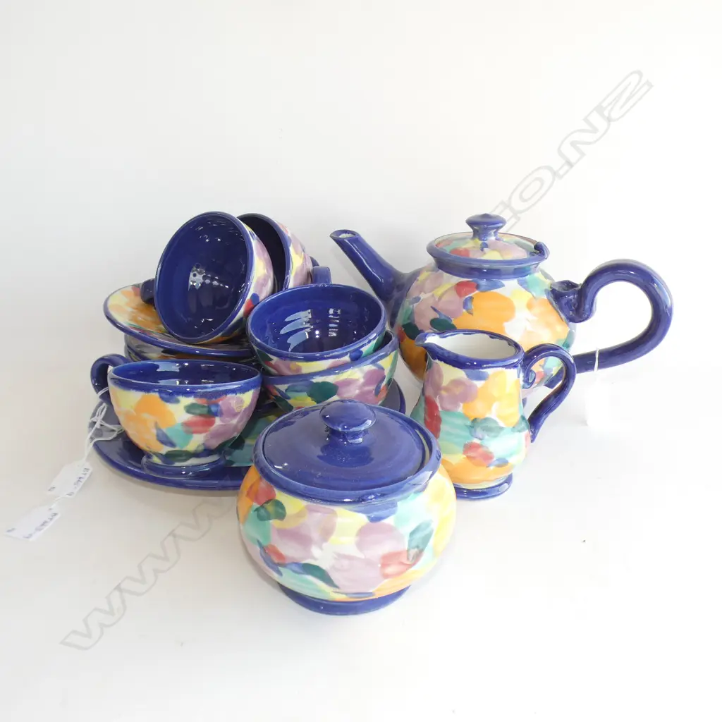 MULTI COLOURED TONY SLY POTTERY - TEASET - 6 CUP TEAPOT / LIDDED SUGAR BOWL / JUG / CAKE PLATE & 5 LG CUPS & SAUCERS Image 1++