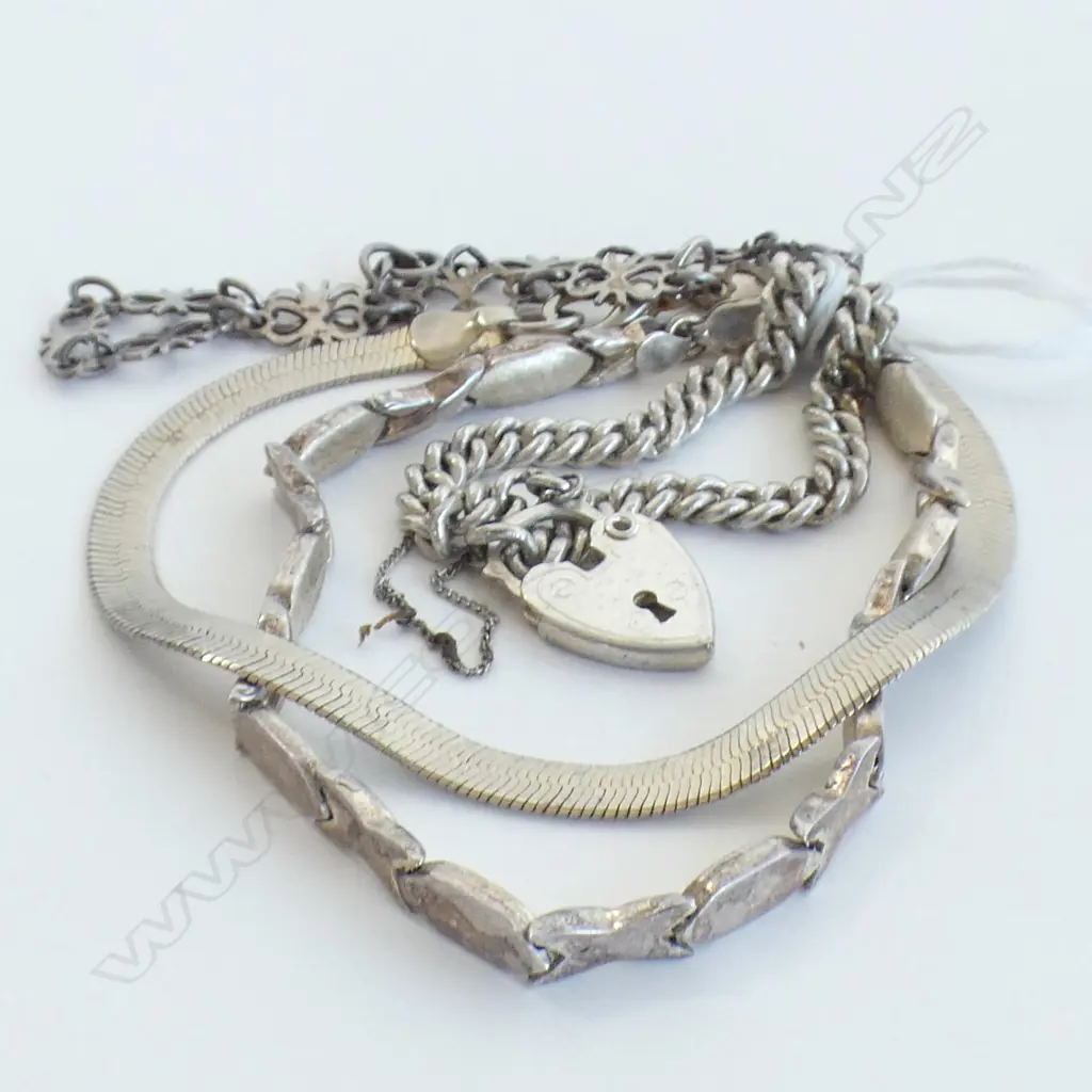 FOUR SILVER BRACELETS Image 1++