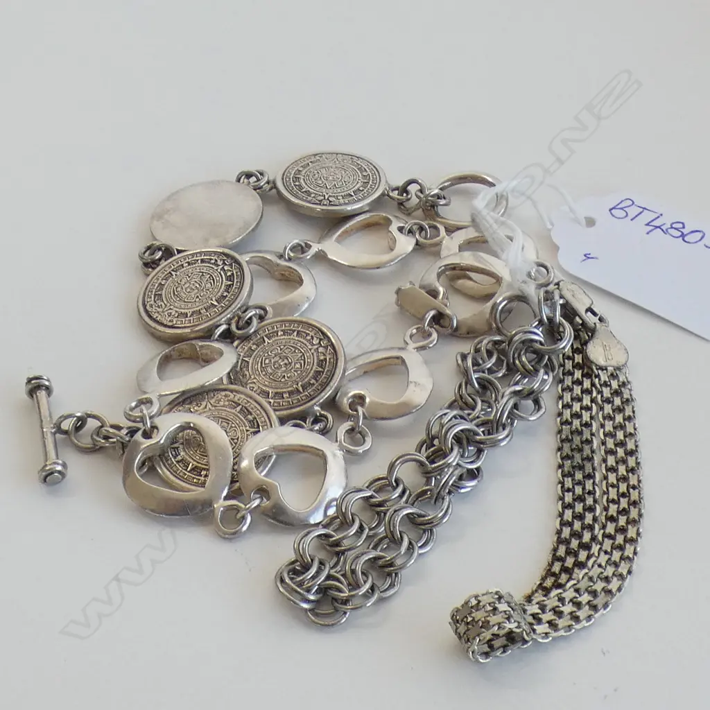FOUR SILVER BRACELETS Image 1++