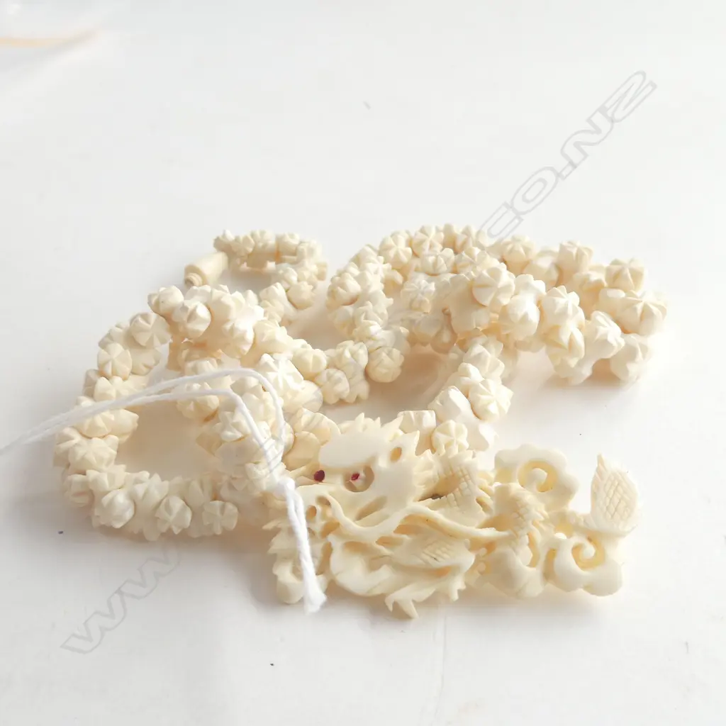 BONE NECKLACE AND BONE DRAGON BROOCH Image 1++
