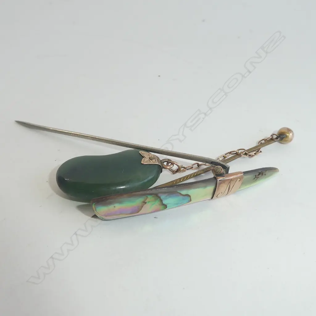 2 EARLY 20TH C 9CT STICK PINS - 1 GREENSTONE, - 1 PAUA.  Image 1++