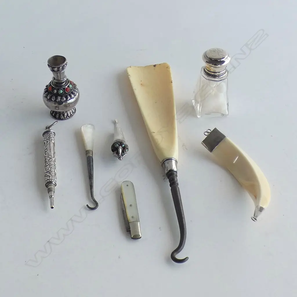 ASST. SILVER ITEMS; IVORY SHOE HORN / BUTTON HOOK L.220mm, STG TUSK PENDANT, 2 MINI BOTTLES, 2 MOP TOOLS, PENCIL  Image 1++