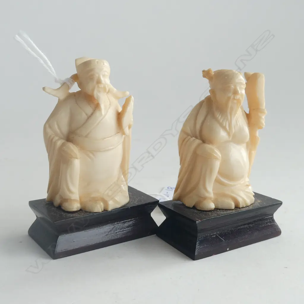 TWO CARVED IVORY FIGURES ON STANDS Image 1++