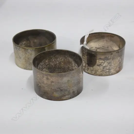 3 STG SILVER NAPKIN RINGS 100 GRAMS....