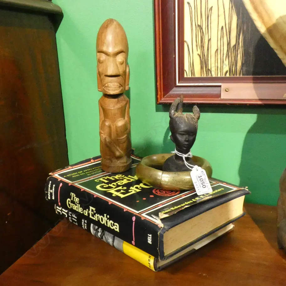 2 BOOKS; 'JU-JU IN MY LIFE', 'THE CRADLE OF EROTICA' + A BRONZE TRIBAL BANGLE + 2 CARVED WOODEN FIGURES Image 1++