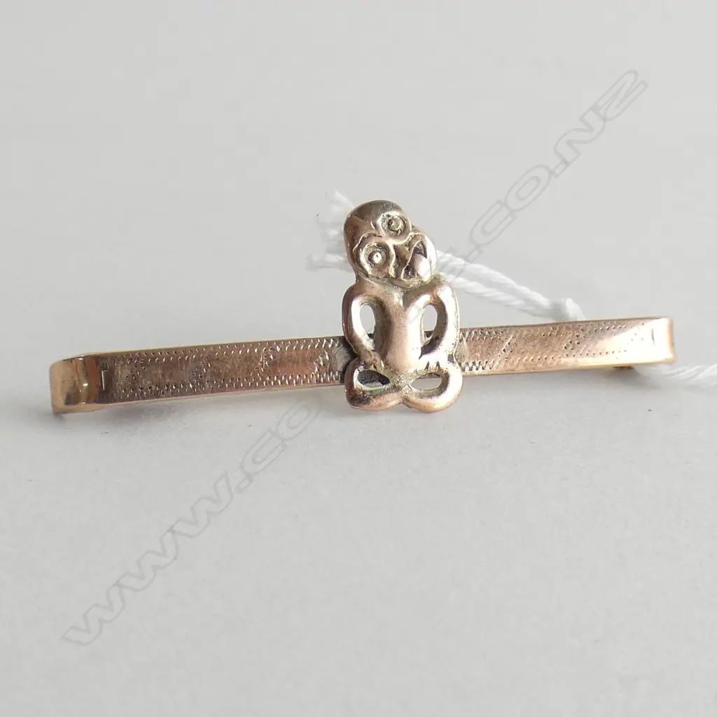 VINTAGE 9CT 'TIKI' BROOCH Image 1++