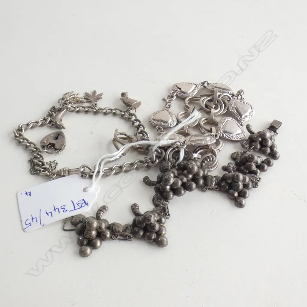 4 STG BRACELETS; CHARM ETC 75 GRAMS Image 1++