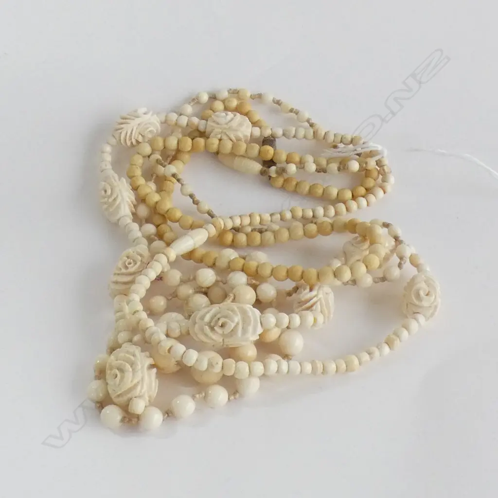 THREE IVORY BEADED NECKLACE, ONE WITH CARVED ROSES , LONGEST: 750mm Image 1++