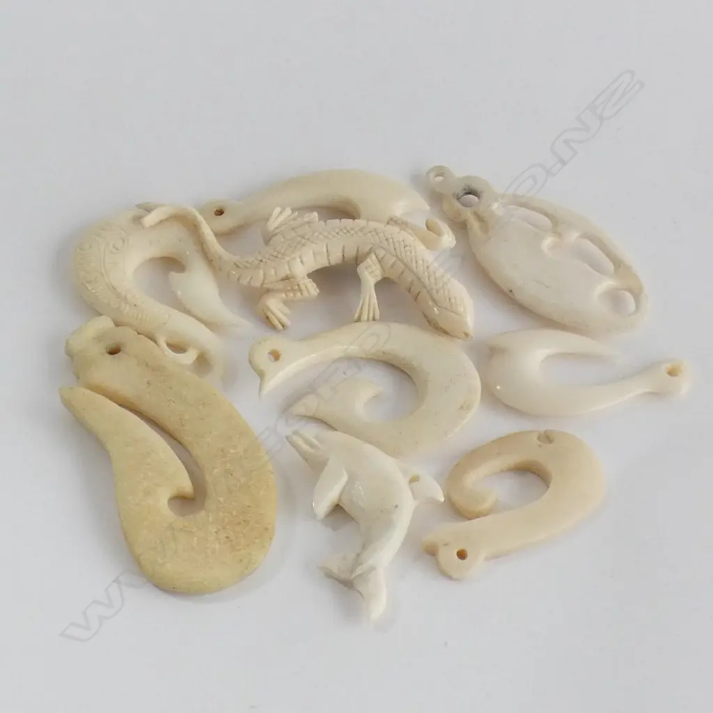 EIGHT ASST CARVED BONE NEW ZEALAND PENDANTS, LARGEST 30 x 60mm Image 1++