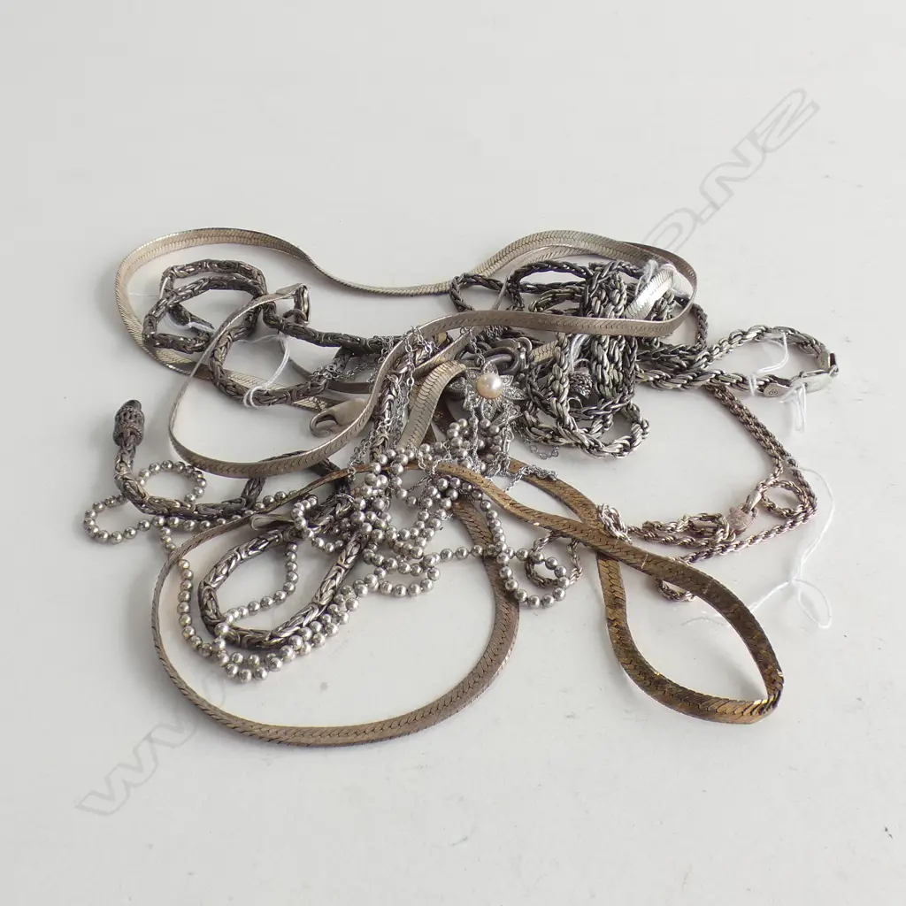 BAG ASST. SILVER NECKLACES ETC 75 GRAMS Image 1++