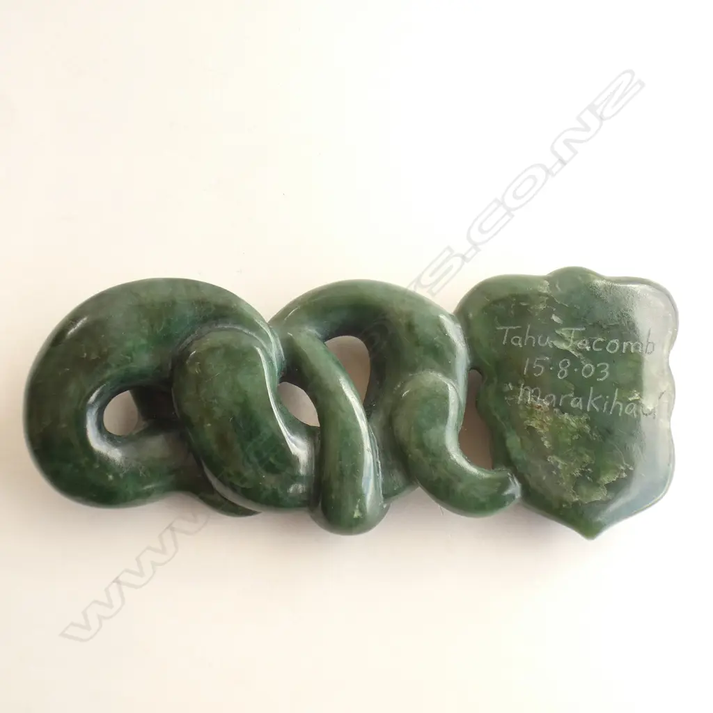 zoomorphic carving with whale tail Image 1++