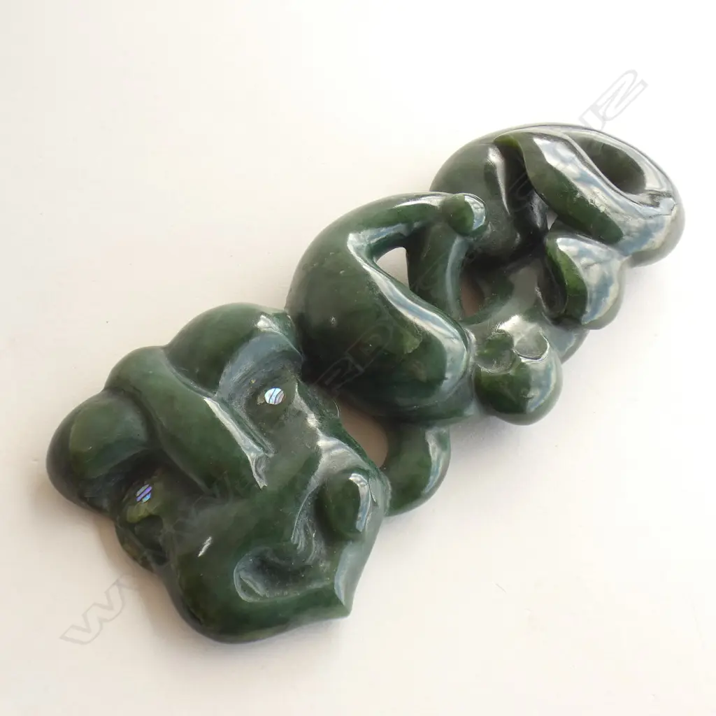zoomorphic carving with whale tail Image 1++