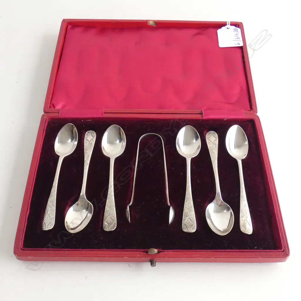 6 STG SILVER TEASPOONS & TONG SET, CASED 65 GRAMS Image 1++