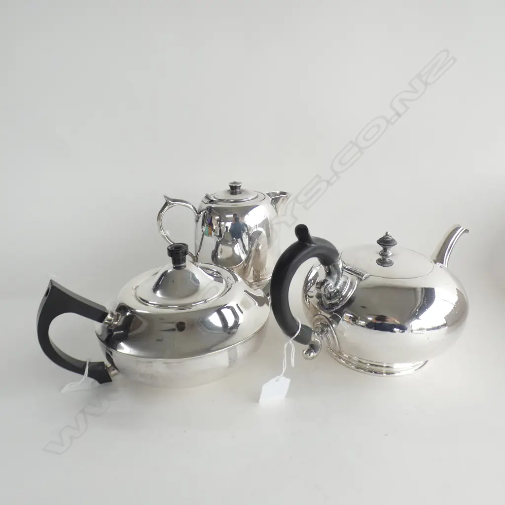 THREE SILVER PLATE TEA POTS Image 1++
