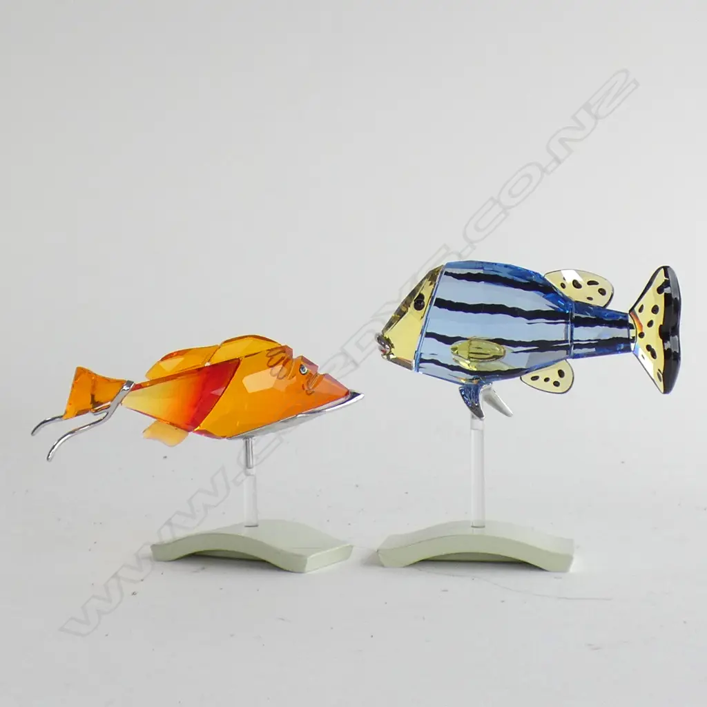 TWO SWAROVSKI CRYSTAL FISH; CATUMBELA LT SAPPHIRE & CROTONE FIRE OPAL (L83MM) BOTH IN ORIGINAL BOXES W SLEEVES Image 1++