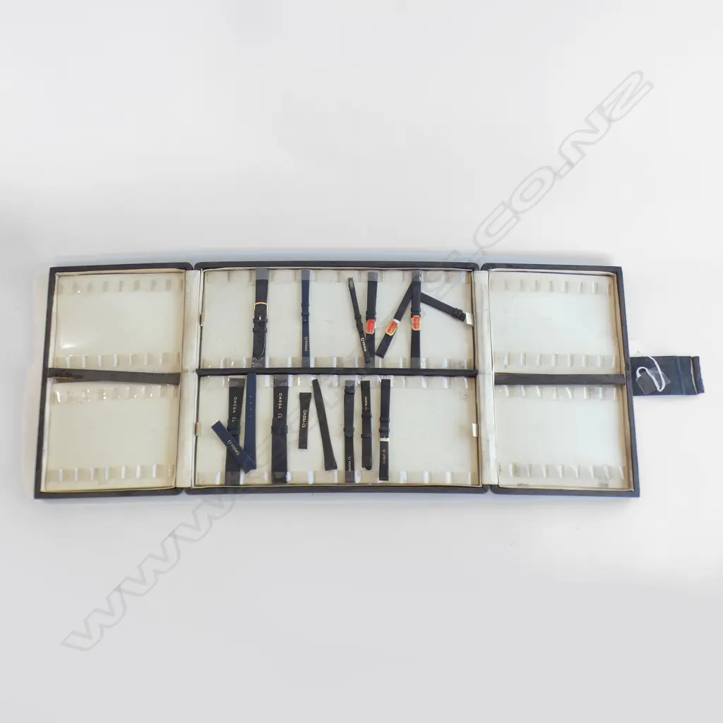 (A) OMEGA WATCH STRAP FOLDER WITH SOME STRAPS Image 1++