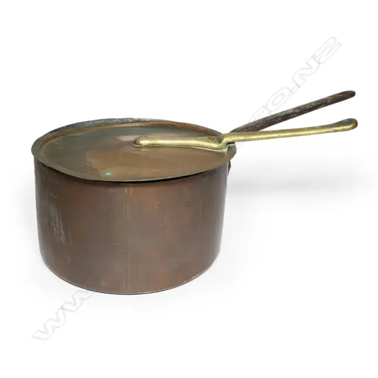 A large vintage copper pot