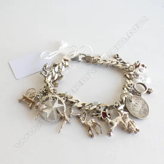 ITALIAN 925 SILVER CHARM BRACELET  43.6GMS