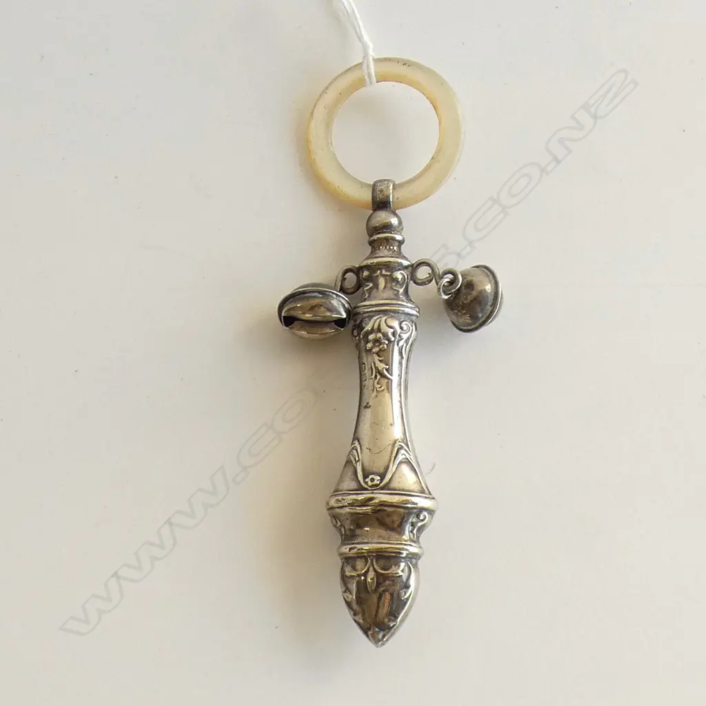 A silver and mother of pearl baby rattle, Image 1++