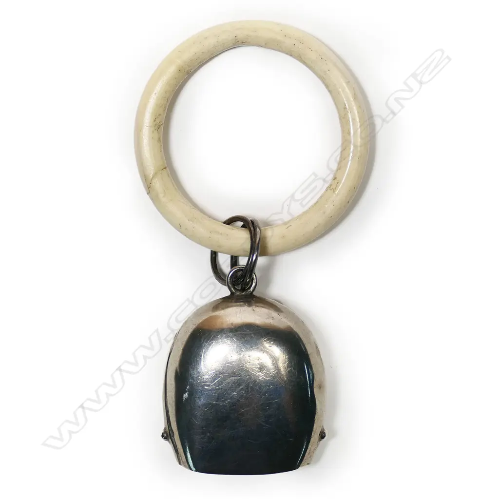 A silver and bone baby rattle, Image 1++