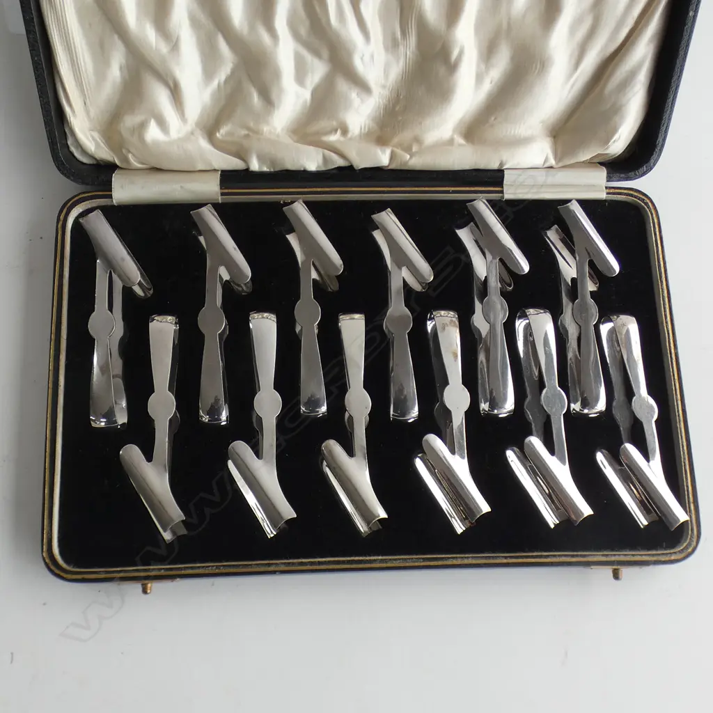 BOXED SET OF 12 SILVER PLATE INDIVIDUAL ASPARAGUS SERVERS Image 1++