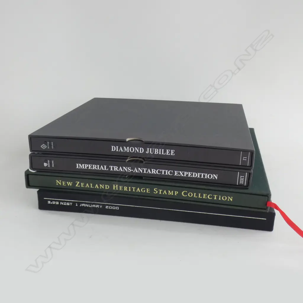 4 NZ STAMP BOOKS; 2000, HERITAGE, DIAMOND JUBILEE, TRANS-ANTARCTIC Image 1++