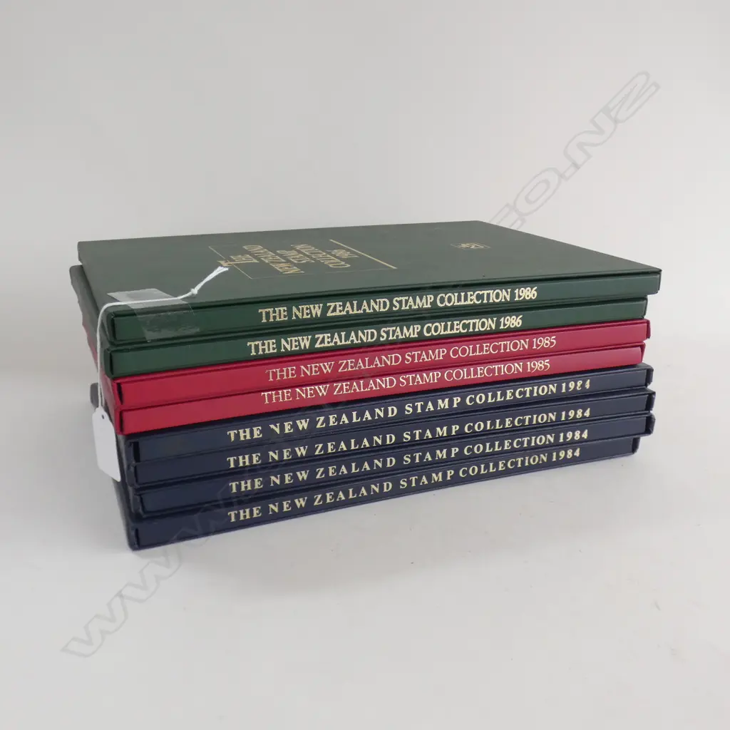 8 THE NZ COLLECTION STAMP BOOKS; 4x 1984, 2x 1985, 2x 1986  Image 1++