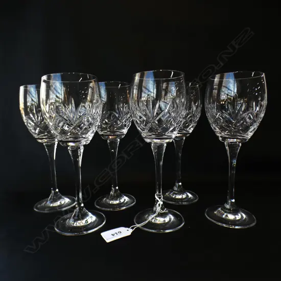 SIX HEAVY CUT CRYSTAL STEMMED WINE GLASSES