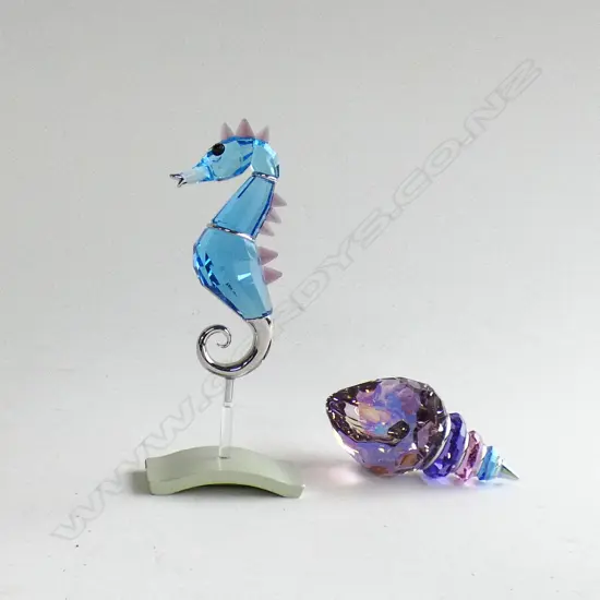 2 SWAROVSKI SEA CREATURES; AQUAMARINE CHIPILI (SEAHORSE) & BLUE VIOLET CORUNNA (L 60MM) BOTH IN ORIGINAL BOXES W SLEEVES