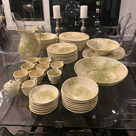 DESIGNER CERAMIC 'MALIBU B WARE' MOSS GREEN DINNER SERVICE, BY BRENDA HOLZKE, (some faults, one bowl missing)