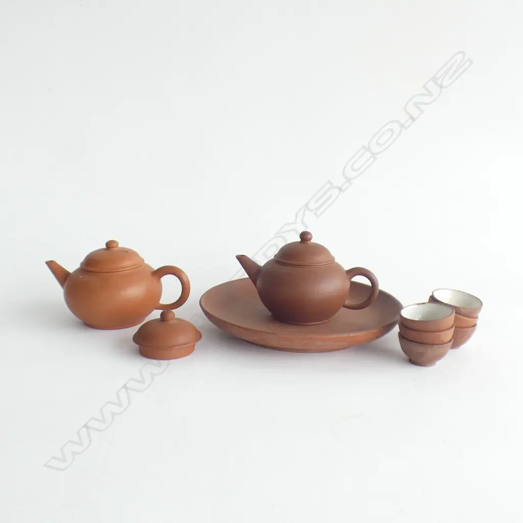 MINIATURE ORIENTAL 8 PC TERRACOTTA TEASET; TRAY, 6 CUPS & TEAPOT + 1 OTHER TEAPOT & SPARE LID Image 1++