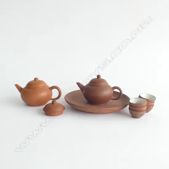 MINIATURE ORIENTAL 8 PC TERRACOTTA TEASET; TRAY, 6 CUPS & TEAPOT + 1 OTHER TEAPOT & SPARE LID