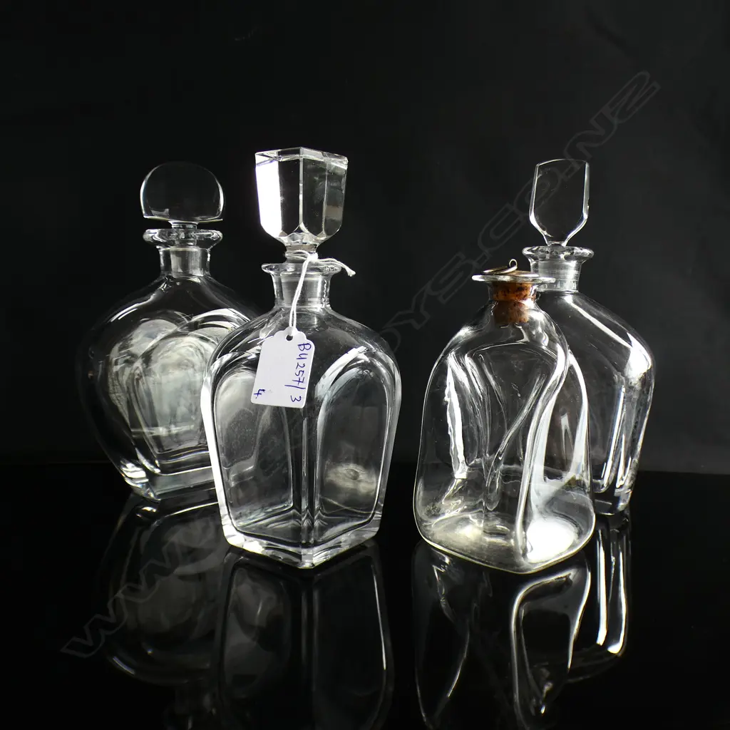 4 PCES ART GLASS BOTTLES; PR ORREFORS DECANTERS H.215mm, KOSTA BODA & HOGLUND (2 STOPPERS w. CHIPS) Image 1++