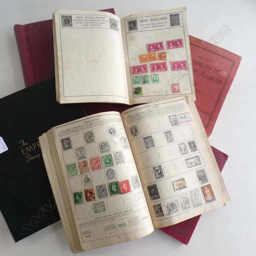 6 VINTAGE STAMP ALBUMS Image 1++