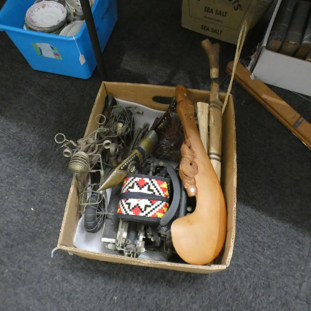BOX LOT VINTAGE TYPEWRITER, KNIVES, WIRE MOTOBIKE, CARVED WOODEN MOARI WEAPON ETC Image 1++