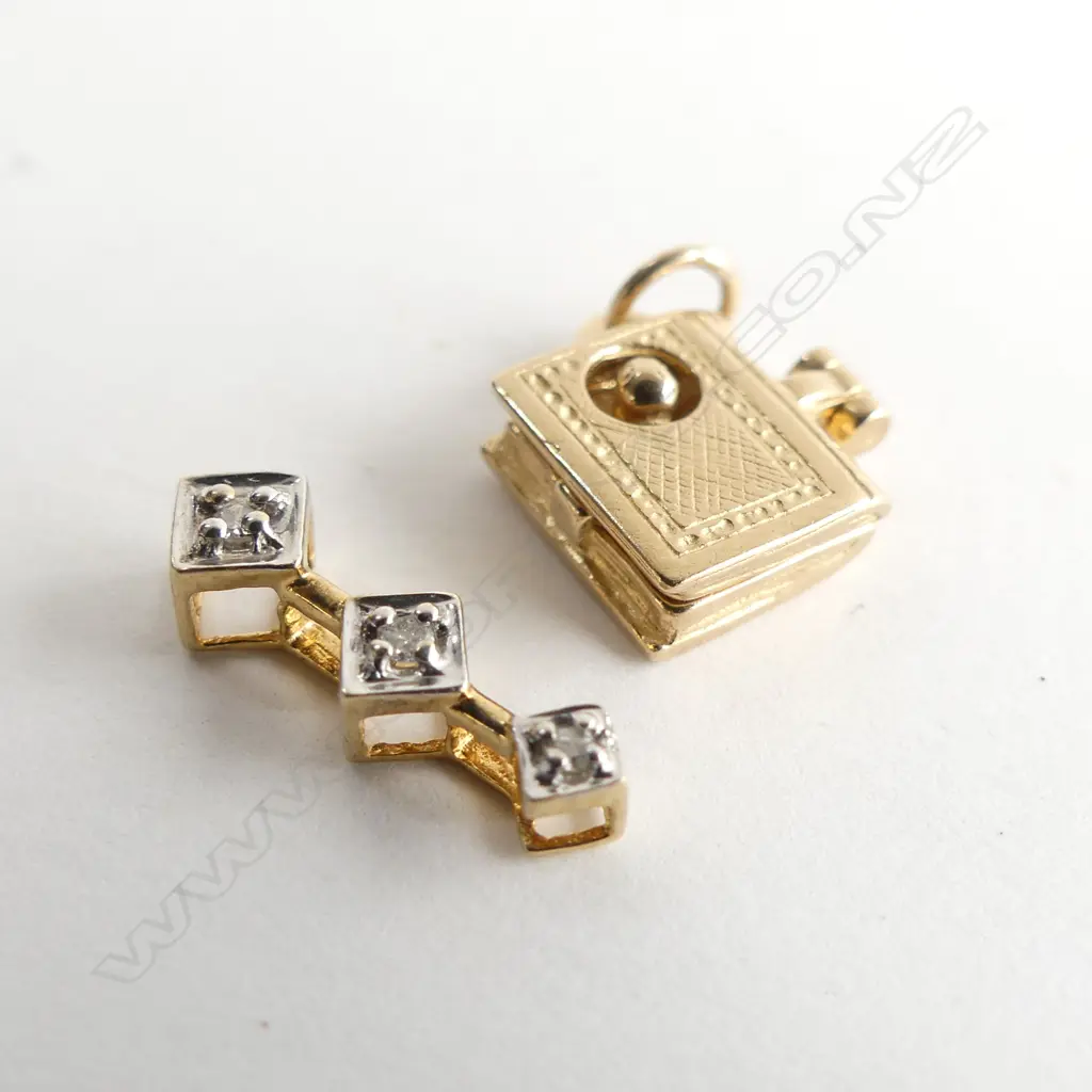 2 GOLD PENDANTS; 9CT 'BOOKWORM' + 10CT TRIPLE DIAMOND 3 GRAMS Image 1++
