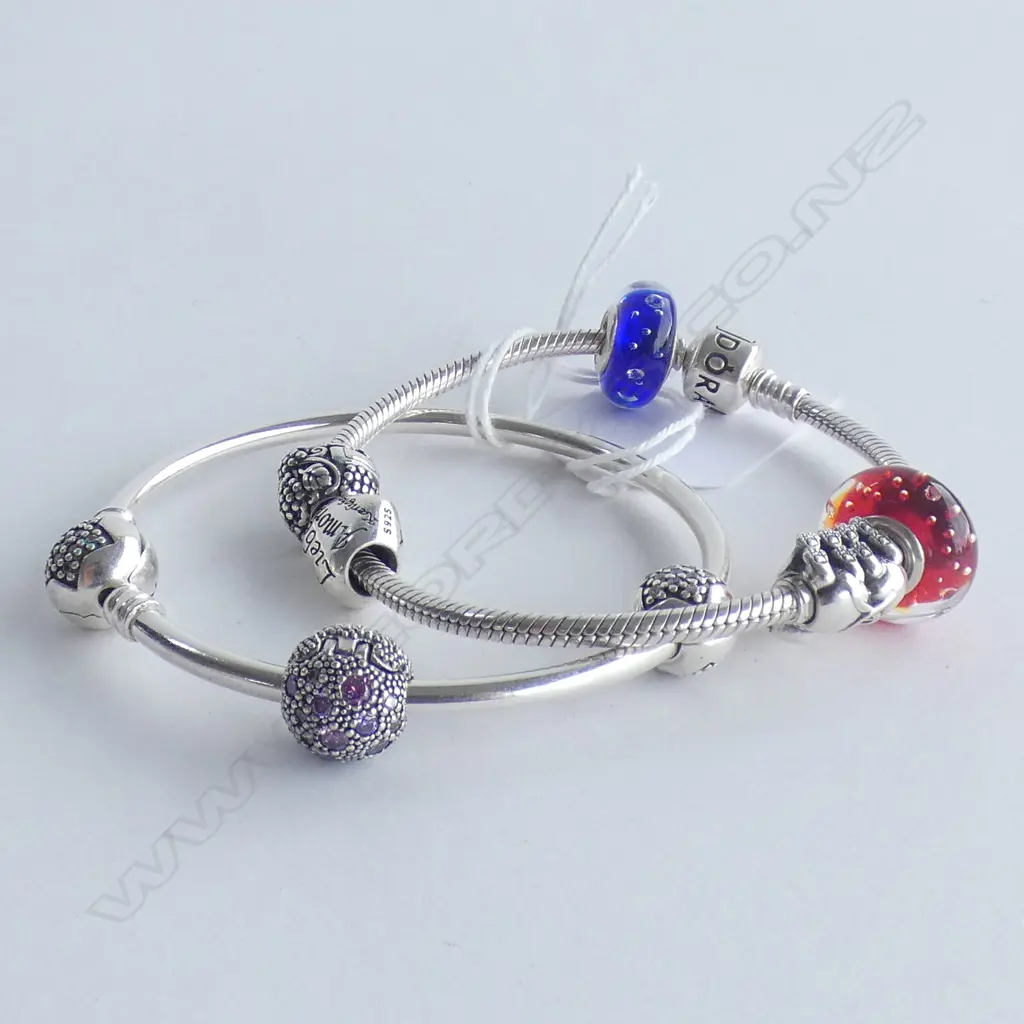 2 PANDORA BRACELETS WITH SOME SILVER BEADS Image 1++