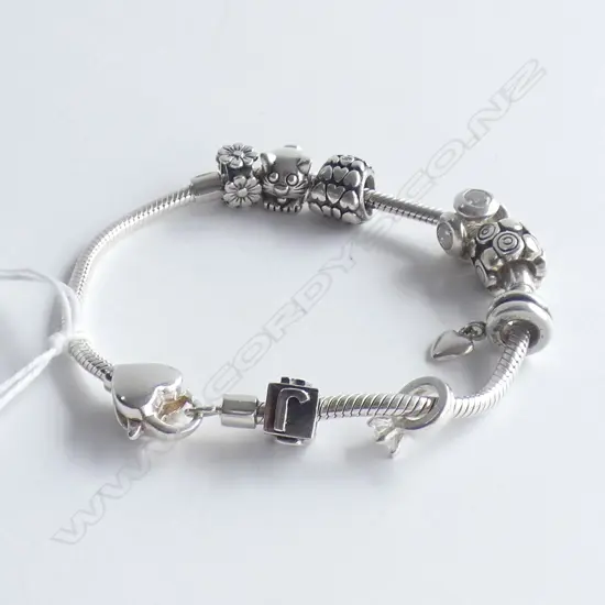 PANDORA ? SILVER BRACELET WITH MULTIPLE BEADS