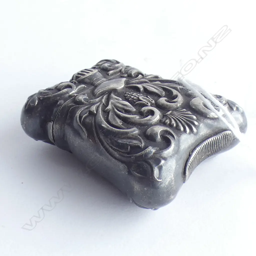 FANCY ANTIQUE EMBOSSED SILVER VESTA W HELMET & SCROLLS Image 1++