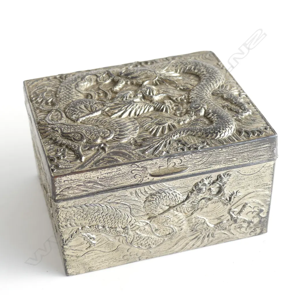 CIGARETTE BOX EMBOSSED WITH DRAGONS AF SOME DAMAGE TO WOOD INSIDE Image 1++