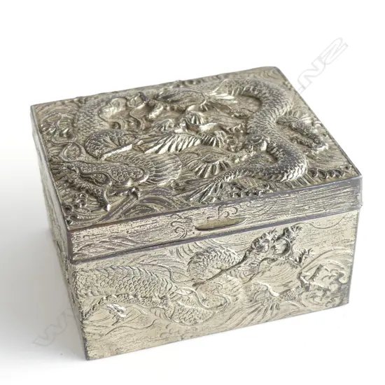 CIGARETTE BOX EMBOSSED WITH DRAGONS AF SOME DAMAGE TO WOOD INSIDE
