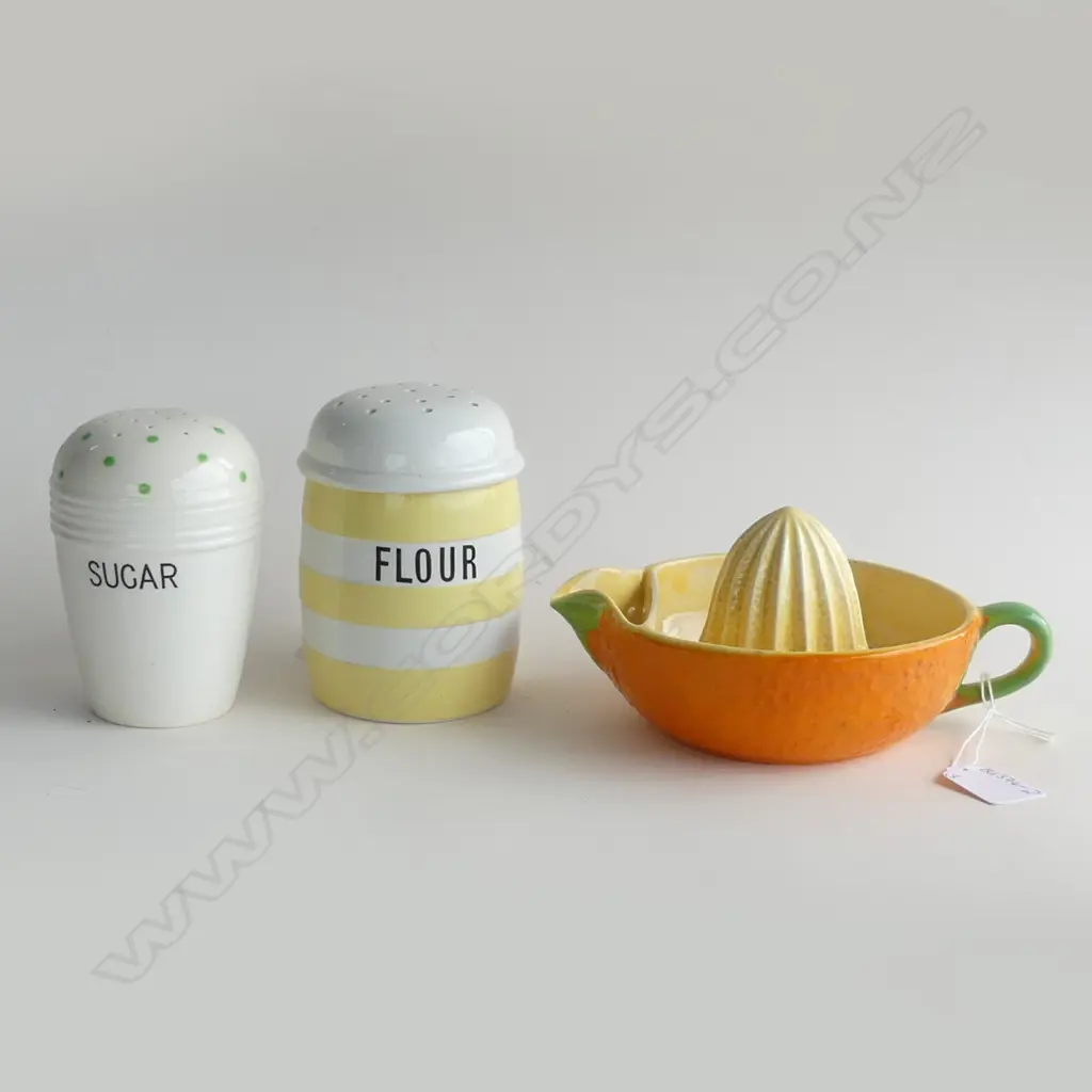 DECORATIVE KITCHEN ITEMS; CROWN DEVON ORANGE SQUEEZER, YELLOW CORNISHWARE FLOUR SHAKER & GREEN POLKA DOT SUGAR SHAKER Image 1++