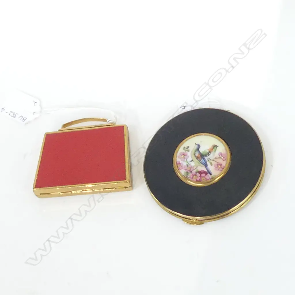 2 VINTAGE COMPACTS; 1 MASCOT RED HANDBAG SHAPE (L 75MM) & 1 KIGU WITH BLACK LID & BIRD ENAMEL DECAL (DIA 90MM) Image 1++