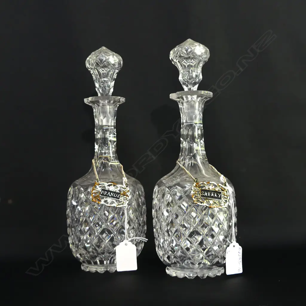 2 VINTAGE HEAVY CUT GLASS DECANTERS W SWING TAGS; BRANDY & SHERRY (H 290MM)  A/F Image 1++