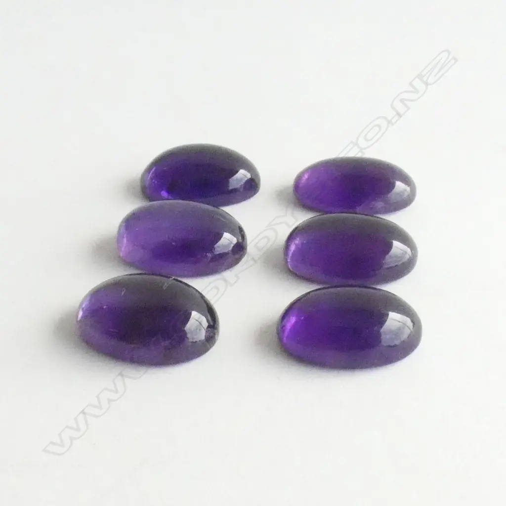 6 X AMETHYST CAB. STONES Image 1++