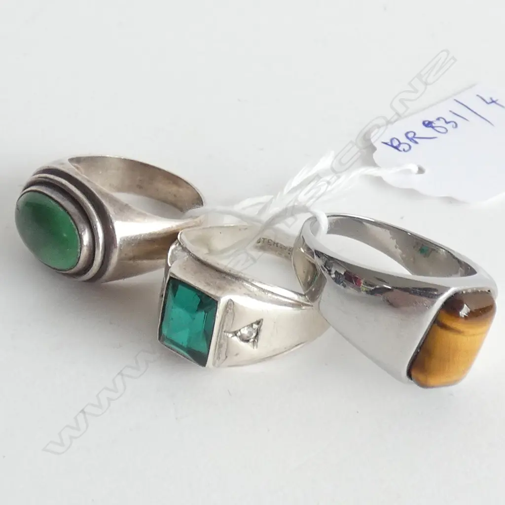 3 RINGS; SYNTHETIC EMERALD 2 WHITE STONES & STG & HIMALAYAN TURQUOISE.TIGERS EYE & 18CT WHITE G.PLATE Image 1++