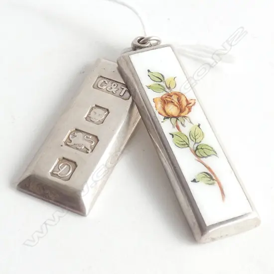 (20125) 2 SILVER INGOT PENDANTS. 1 ENAMELLED 36GM
