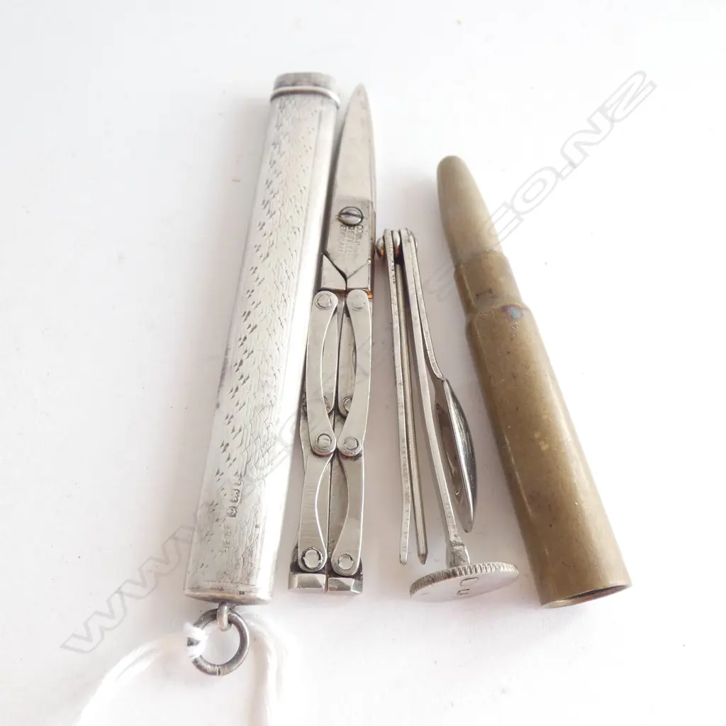 FOLD UP SCISSORS IN STG SILVER CASE(L90MM) & CARTRIDGE SHELL WITH HIDDEN UTENSILS (L 73MM) Image 1++